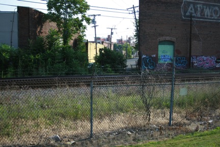 FIGURE 19. Another View of the North Section of Carter Street
Figure 19 is taken from the south side of the commuter rail line and shows the Carter Street dead end on the far side of the railroad tracks.
