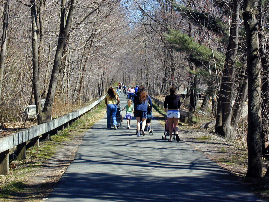 People walking along bicycle path