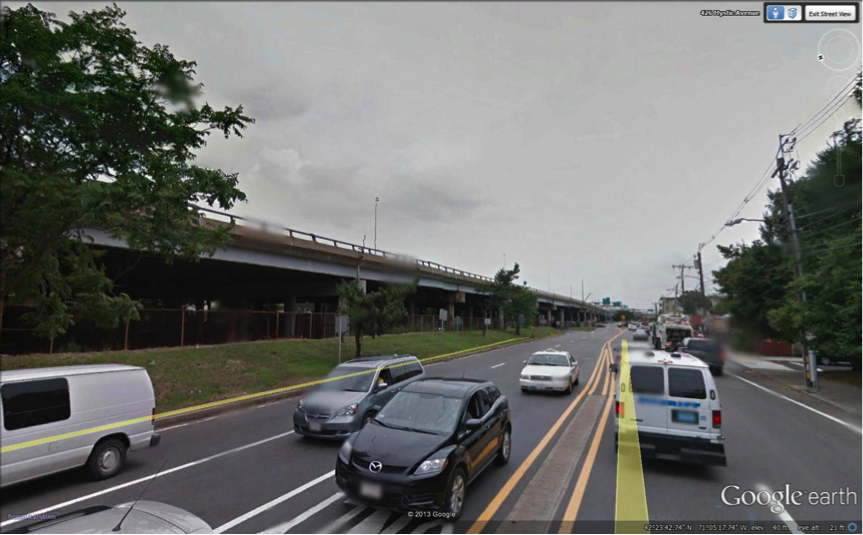 FIGURE 16. Viaduct Approaching Interchange 28/Sullivan Square Exit, View Looking South from Mystic Avenue
Figure 16 contains a color photograph of the above-cited location.
