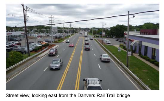 Image shows the street view, looking east from the Danvers Rail Trail bridge