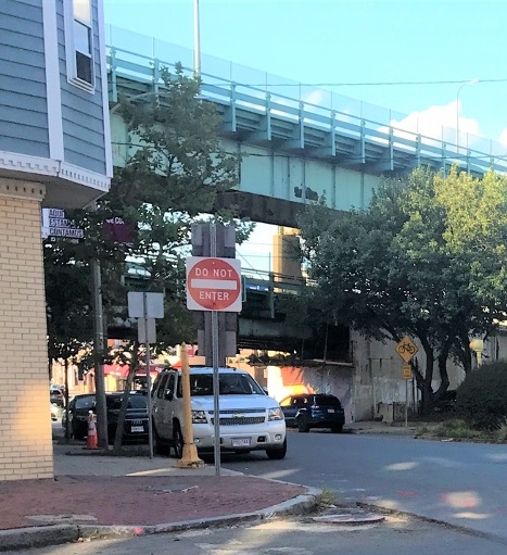 Cars parked north of the intersection on Everett Avenue make it difficult to see oncoming traffic from the Chestnut Street approach.