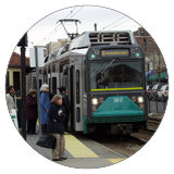 Passengers waiting to board a Green Line train.